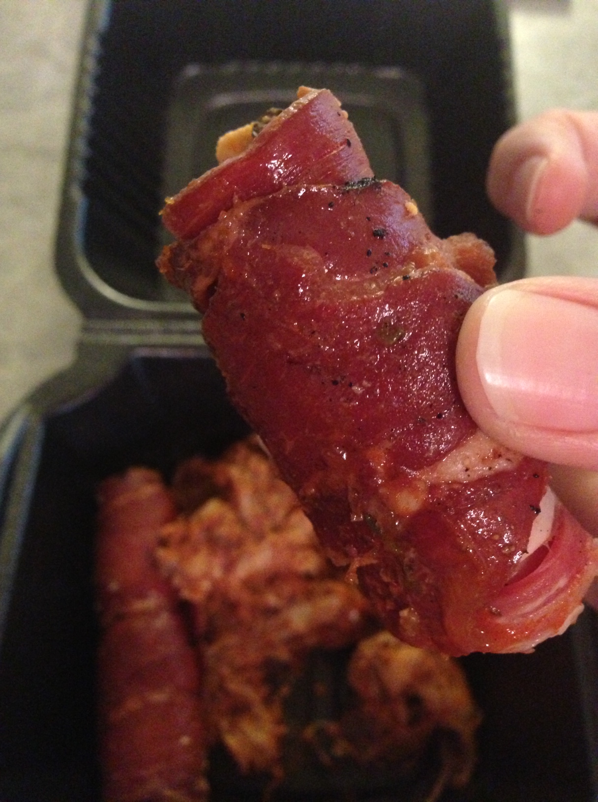 Closeup image of prosciutto-wrapped jalapeno