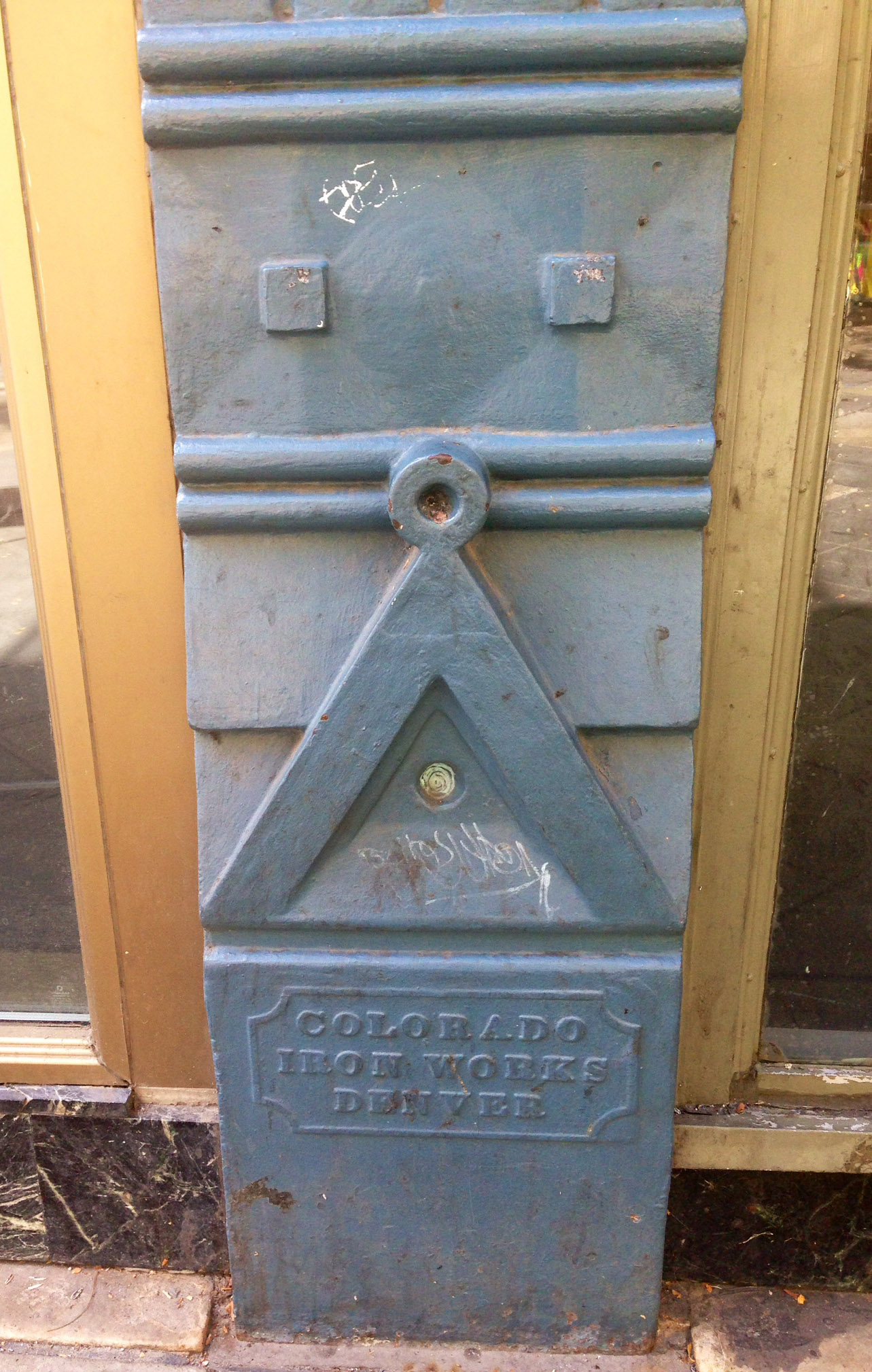 An abstract face formed by iron building architecture