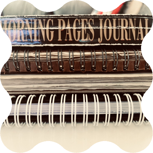Stack of four journals.